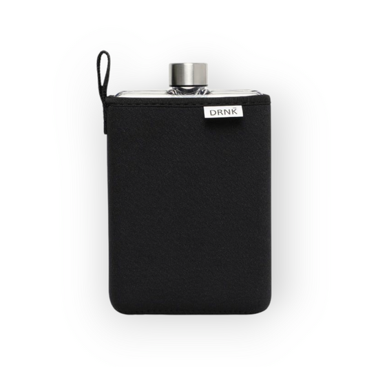 Black DRNK Slim flat Tritan plastic water bottle with black sleeve, front view